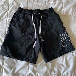 Nike black nylon shorts w/mesh inside, size medium